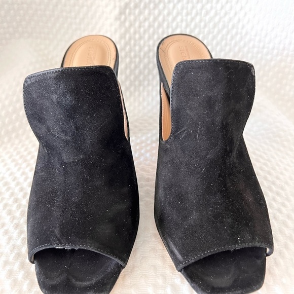 Previously enjoyed a few times. Woman’s black slip on heels. - Picture 2 of 4